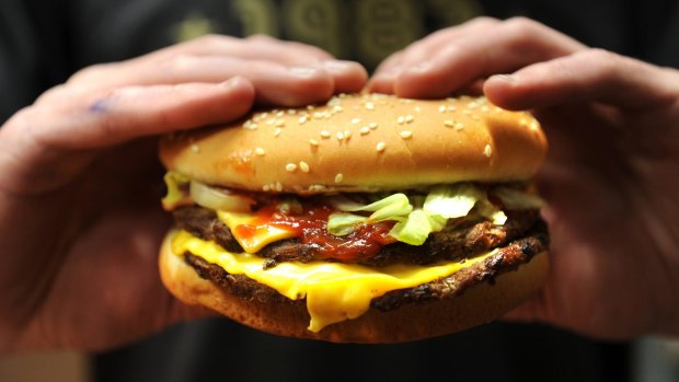 Fast-food workers are among those facing cuts.