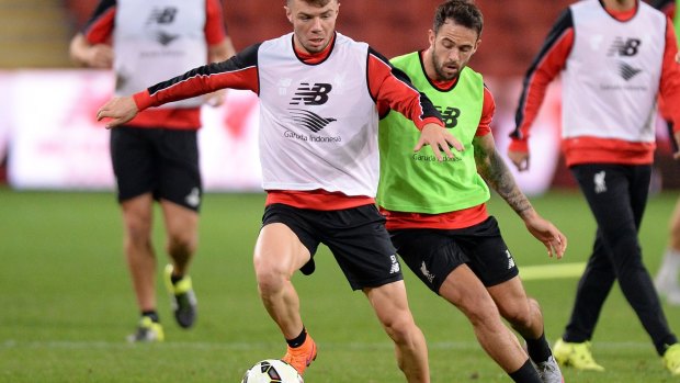 Joe Maguire looks to take on the defence during a Liverpool FC training session at Suncorp Stadium.