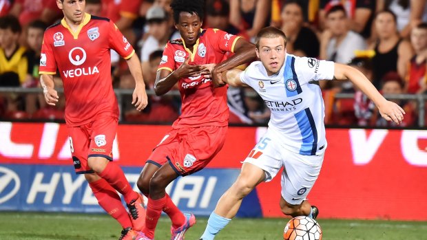 Jacob Melling of Melbourne City looks to pass.