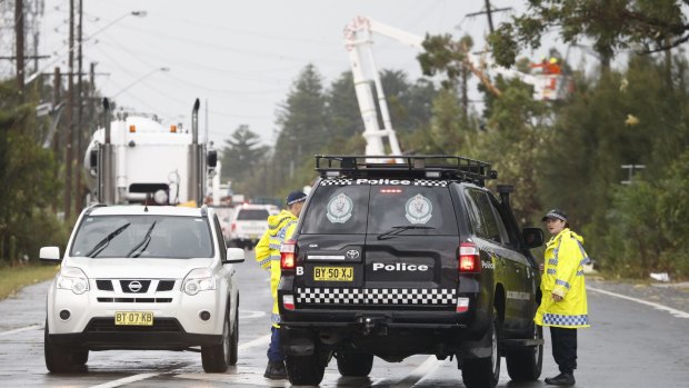 Police and emergency services on the road into Kurnell.