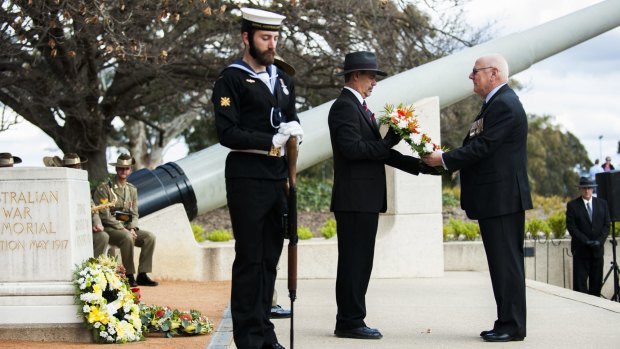 RSL president Peter Eveille lays a wreath at the Australian War Memorial in Canberra on Saturday.