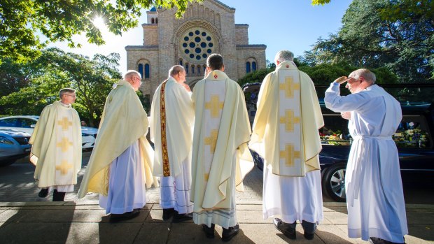 The funeral for Sir Peter Lawler at St Christopher's Cathedral at Manuka.