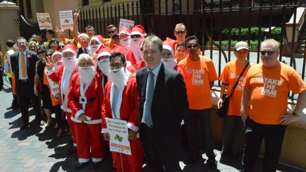 Shop union members protest against any Christmas Day retail trading outside the NSW Parliament House in Macquarie Street. 