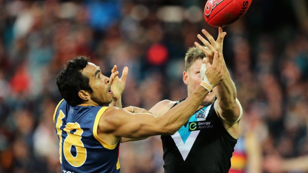 Eddie Betts of the Crows competes for the ball.