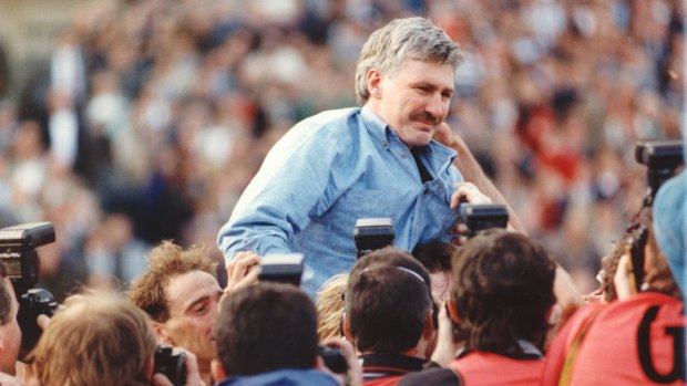 Malthouse is chaired off after West Coast won the flag against Geelong in 1992.