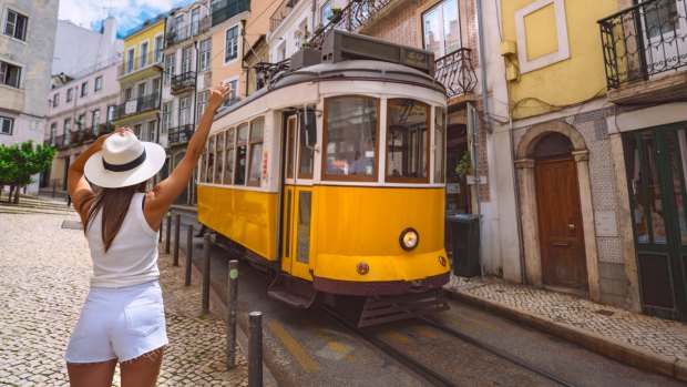 The popular Tram 28 that winds its way along the hilly streets of Alfama and Graça is packed like a Portuguese sardines can, though there's plenty of breeze blowing through the open windows.