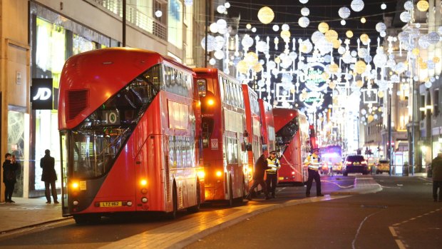 Buses are parked on Oxford Street after the area was evacuated.