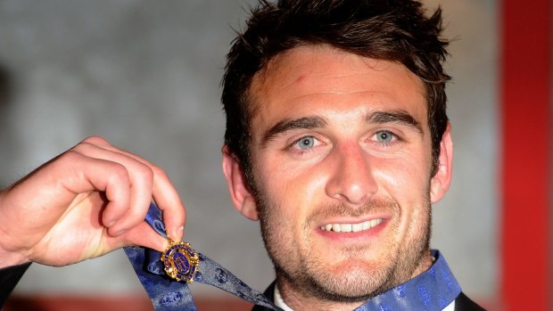 Banned Essendon player Jobe Watson with his 2012 Brownlow Medal.