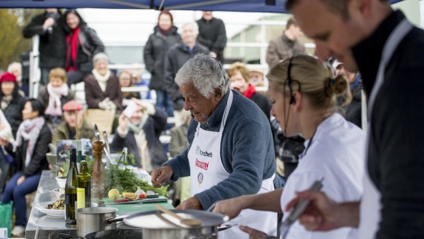Italian chef Antonio Carluccio makes a star appearance at the Capital Region Farmers Market in Canberra. Treasurer Andrew Barr is in the foreground. 
