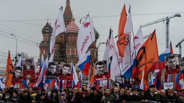 Russian media reported that more than 56,000 marchers passed through metal detectors set up at the start of the route.