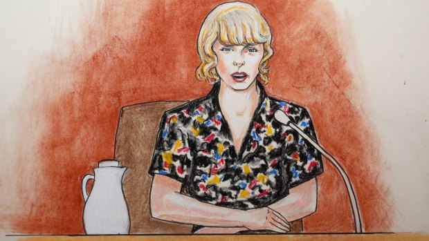 In this courtroom sketch, pop singer Taylor Swift testifies.