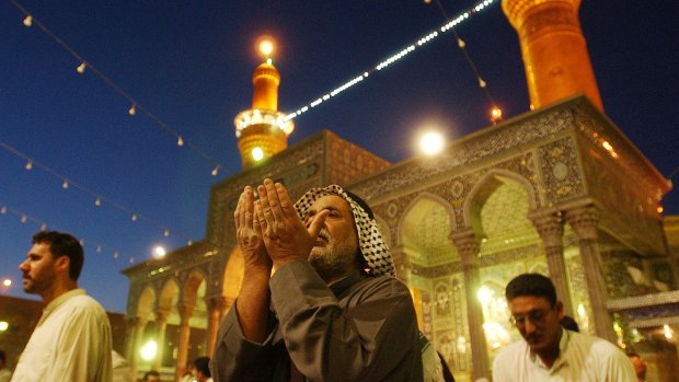 Pilgrims pray at the Imam Hussein shrine in Karbala, to mark the end of the 40-day mourning of the death of Imam Hussein. 