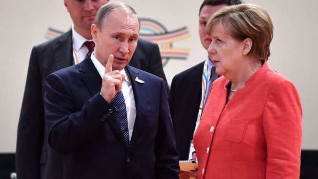 German Chancellor Angela Merkel appeared to roll her eyes while listening to Russia's President Vladimir Putin.