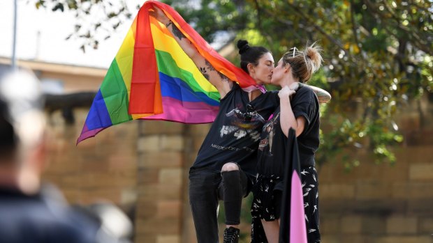 Same-sex marriage supporters rally in Sydney. The fact is, such couples do not have equivalent legal rights.