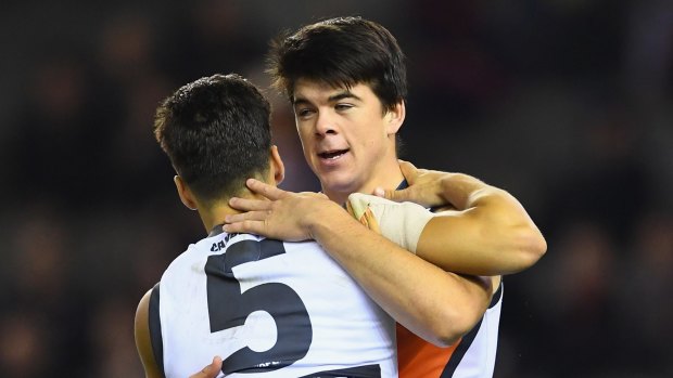 Giant Matthew Kennedy booted three goals on debut.