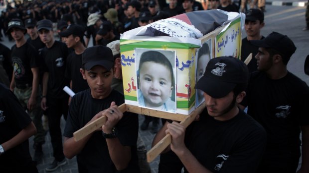The coffin carrying the body of one-and-a-half year old Ali Dawabsheh included the Arabic inscription: "They burned the baby and I am coming to revenge."