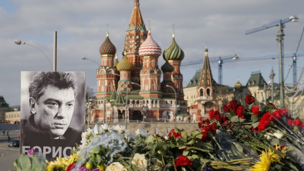 A memorial to Boris Nemtsov lies at the site of his killing in Moscow.