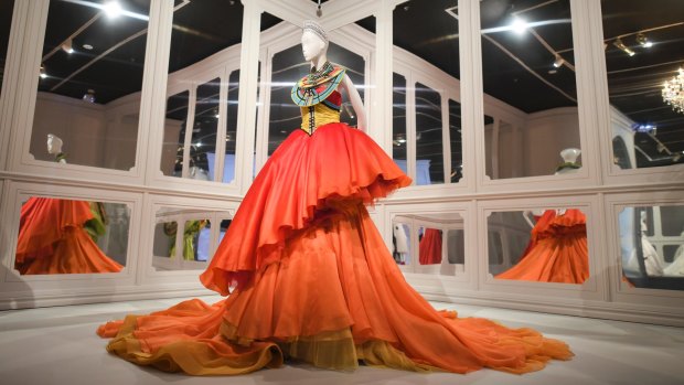 The exhibition showcases Dior's designs through seven decades.
