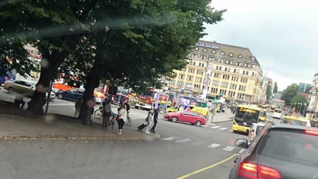 Emergency services at Market Square in Turku, where several people were stabbed and a man was shot by police.