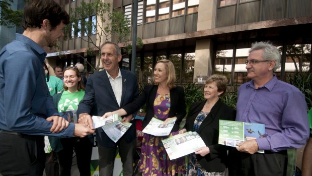 Bob Brown, Senator Larissa Waters, Christine Milne and candidate Andrew Bartlett pressed the flesh at a Brisbane pre-poll on Tuesday.