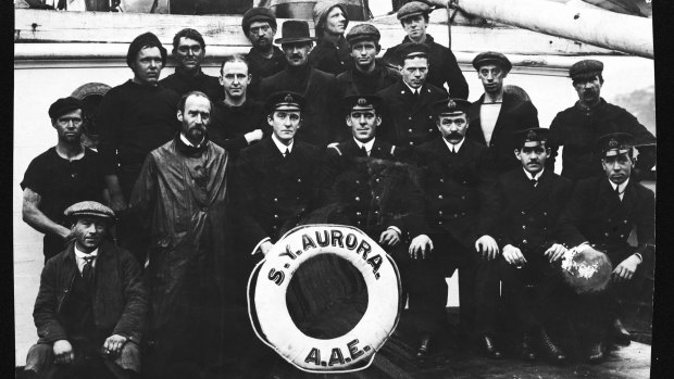 The crew of the Steam Yacht Aurora, which included Clarence Petersen de la Motte, front row, right.