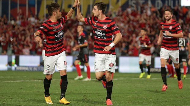 Pride and joy: Tomi Juric and the Wanderers restored some honour with their come-from-behind win over Adelaide.