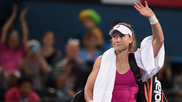 Sam Stosur leaves the court in Brisbane.