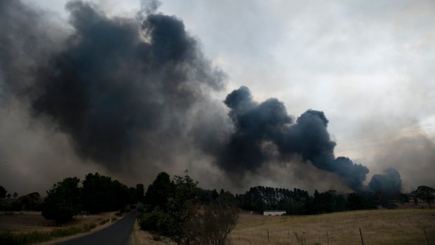 Thick smoke from the grass fire east of Queanbeyan on Friday afternoon.