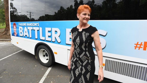 One Nation leader Pauline Hanson with her party's "Battler Bus" in Brisbane.