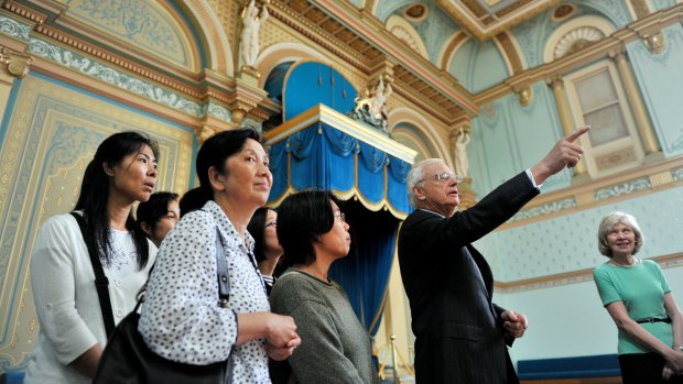 Alex Chernov, Governor of Victoria, and his wife, Elizabeth, meet students from Kew Neighbourhood Learning Centre during their tour of Government House in December 2012.