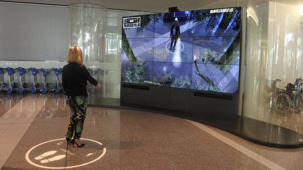 A new augmented reality feature in the arrivals terminal at Canberra Airport showcases?some of the Canberra region's tourism experiences.