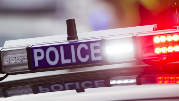 Gold Coast police are investigating after a man was found with a suspected stab wound near an ambulance station. 