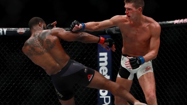 Tyron Woodley (left) in action against Stephen Thompson in their welterweight championship bout.