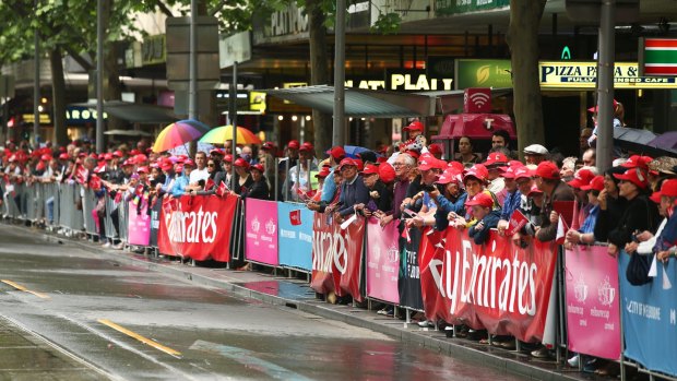 Crowds gather to watch the 2015 Melbourne Cup Parade.