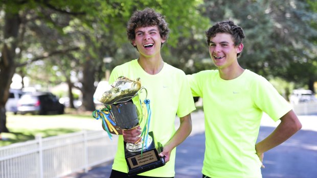 Thomas Newman (with trophy) and his identical twin Jack finished first and second in the Queanbeyan Gift. 