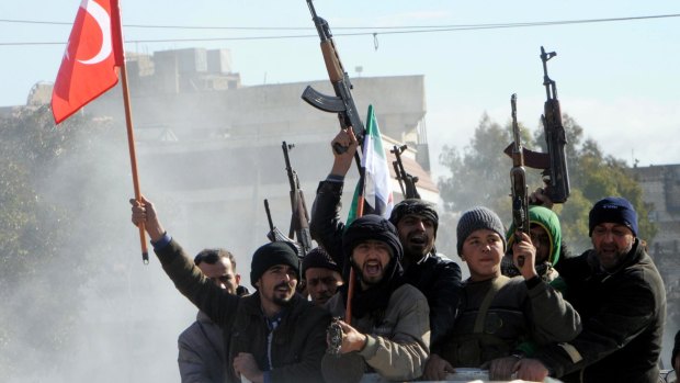 Turkey-backed Free Syrian Army fighters in the Syrian town of Azez near the border with Turkey, on Friday.