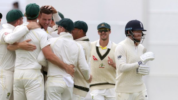Sinking ship: England's Jonny Bairstow walks off after being bowled by Josh Hazlewood.