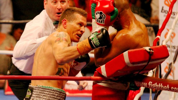 On the ropes: Danny Green takes Roy Jones Jr apart in 2009.