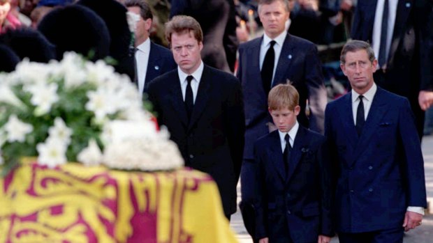 Prince Harry walks between his father Prince Charles and uncle Earl Spencer, at Princess Diana's funeral in 1997.