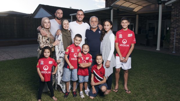 Tarek Elrich with his family at home in Merrylands.