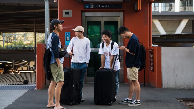Kodai Yasui, Shuia Kamo, Taichi Matsui and Ugyen Tashi would rather order an Uber outside Wolli Creek Station than catch the train to Sydney Airport.