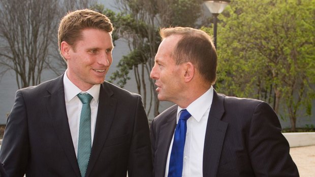 Prime Minister Tony Abbott with Liberal candidate Captain Andrew Hastie  outside the <i>West Australian</i> newspaper offices in Perth on Friday.
