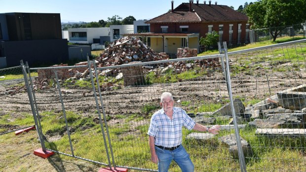 Former boss of the old Kew insitution Max Jackson among dilapidated heritage buildings, 