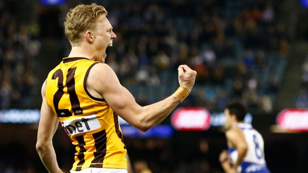Hawthorn's James Sicily celebrates one of his five goals against North Melbourne. 