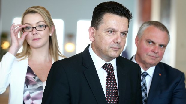 All eyes will continue to be on Nick Xenophon - flanked here by NXT senators Skye Kakoschke-Moore and Stirling Griff. 