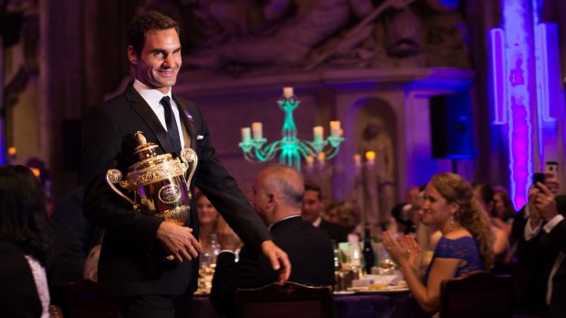 Roger Federer's night of celebration started at Wimbledon's winners dinner.
