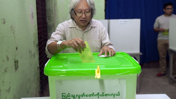A man casts his ballot in Yangon.