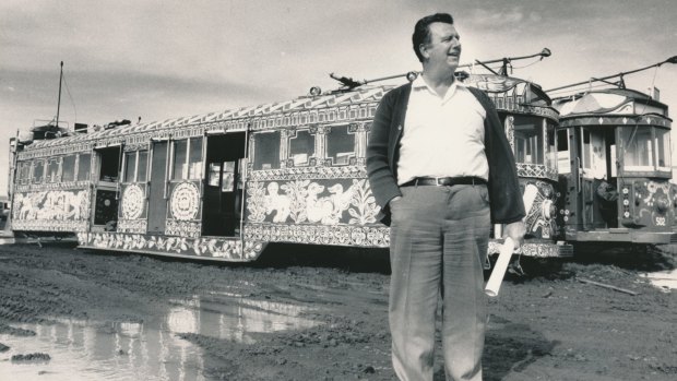 Jim Johnson, a Melbourne scrap metal dealer who planned to create a tram theme park, bought 14 art trams, including Mirka Mora's, pictured behind him. He sold the trams in the late 1980s.