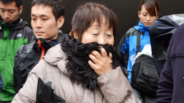 Chisako Kakehi speaks to the media following her arrest. 