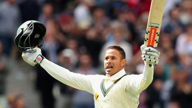 Usman Khawaja celebrates making a century during day one of the second Test between Australia and the West Indies at the MCG on Boxing Day last year.